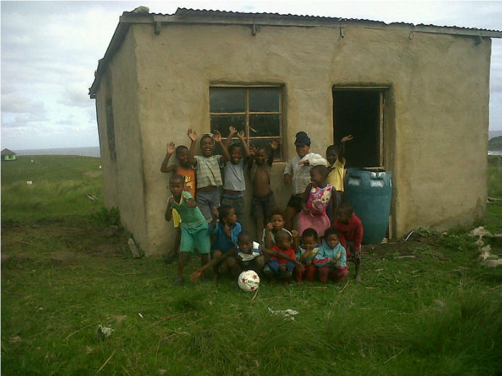 The start of something - a few of the local kids who will be attending the school once completed.  EVERYONE is VERY EXXCITED!